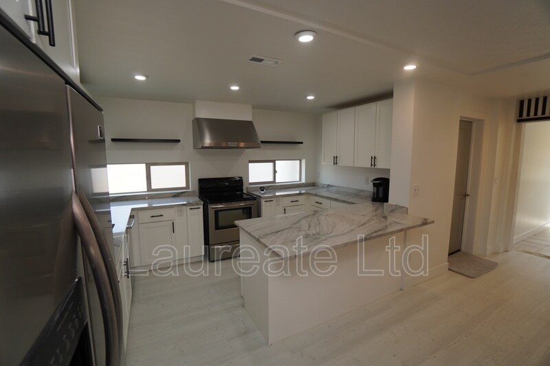 Building Photo - 5090 W 36th Ave