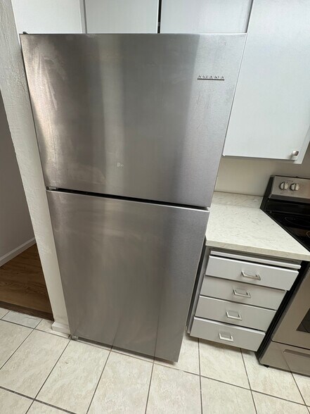 stainless refrigerator - 350 N Civic Dr