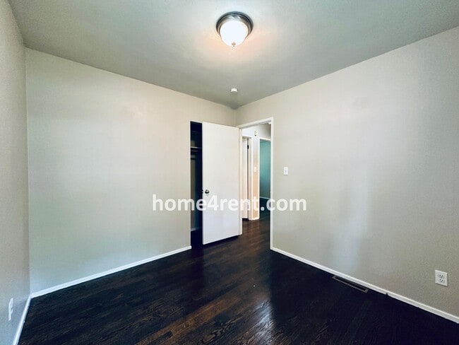 Building Photo - Attractive Prairie Village Ranch w/ FRESH PAINT, Wood Floors, Granite Counters and a Fenced Yard!