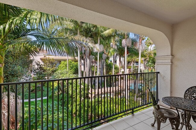 Building Photo - RARELY offered! Top floor three bedroom 2.5 bath El Escorial condo, fully furnished at East Beach.