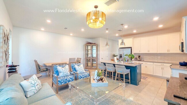 Building Photo - EXCEPTIONAL AND SPACIOUS FURNISHED TOWNHOME WITHIN WATERSIDE- NAUTIQUE!