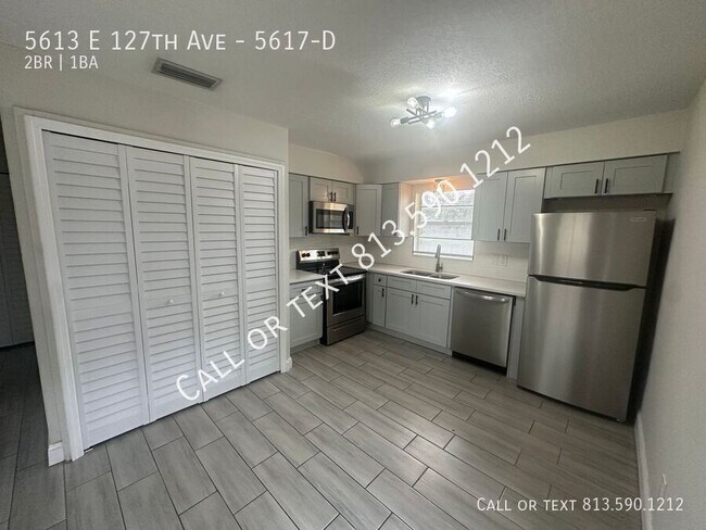 Building Photo - 5613 E 127th Ave