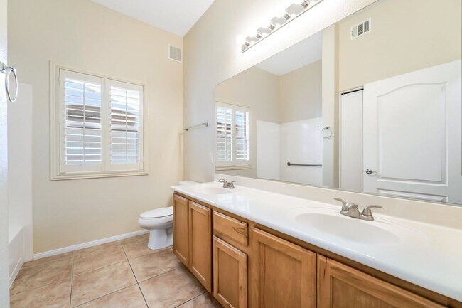 Building Photo - Stylish Silverado Ranch Condo with Modern Finishes & Private Patio!