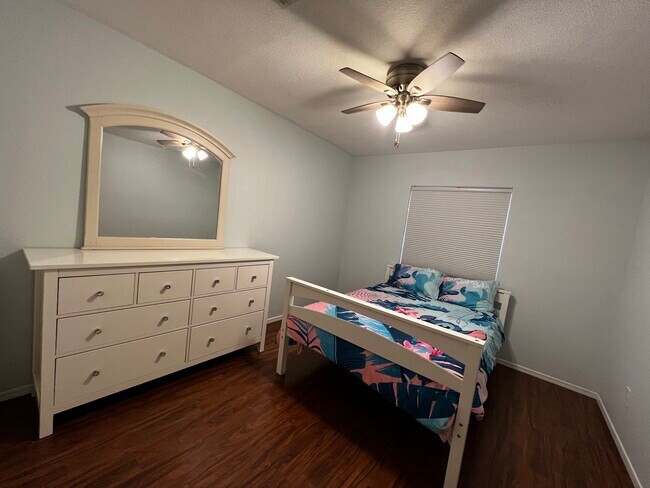 Building Photo - 8443 Forget Me not St