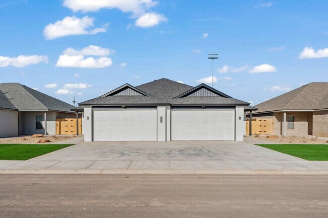 Building Photo - Like-new duplex in Frenship East!