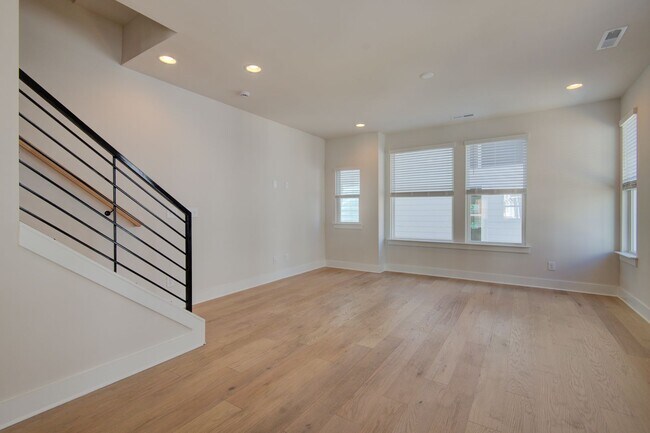 Building Photo - COMING SOON! Modern End-Unit Living Near Uptown | Rooftop Terrace + Tandem Garage