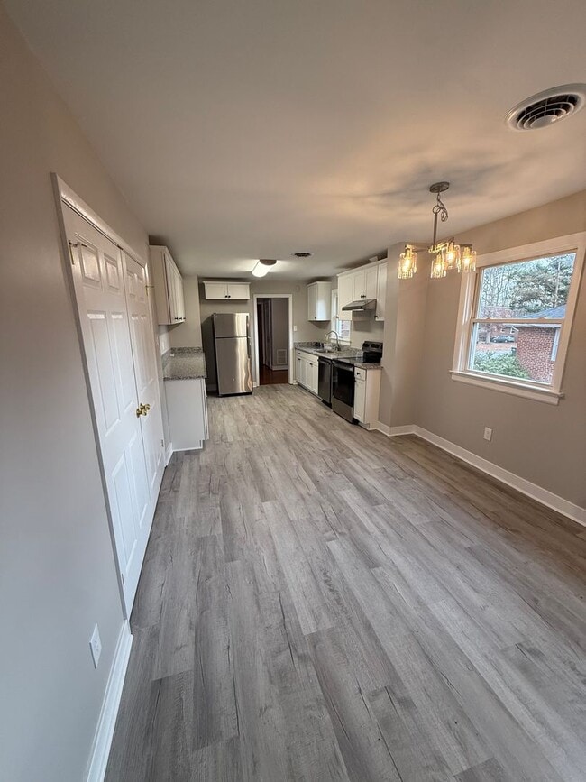 Building Photo - Beautifully RENOVATED 3 bedroom 2 full bath on large fenced in lot--Hurry!