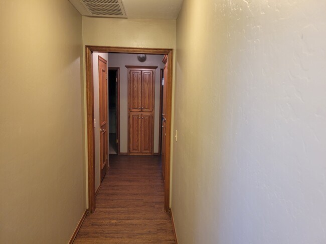 Hallways have vinyl floors as well - 921 Blue Ridge Dr