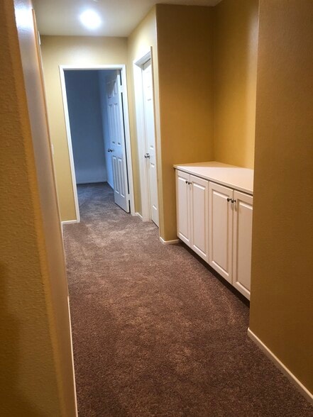 Hallway area to bedrooms. - 6395 Delgado Ln