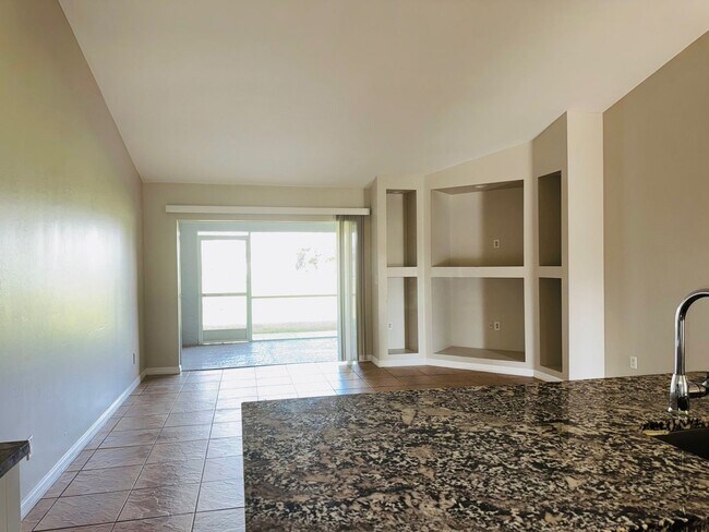 Building Photo - Experience this Cape Coral 3 bedroom 2 bath corner duplex with 1 car garage and screened in lanai.