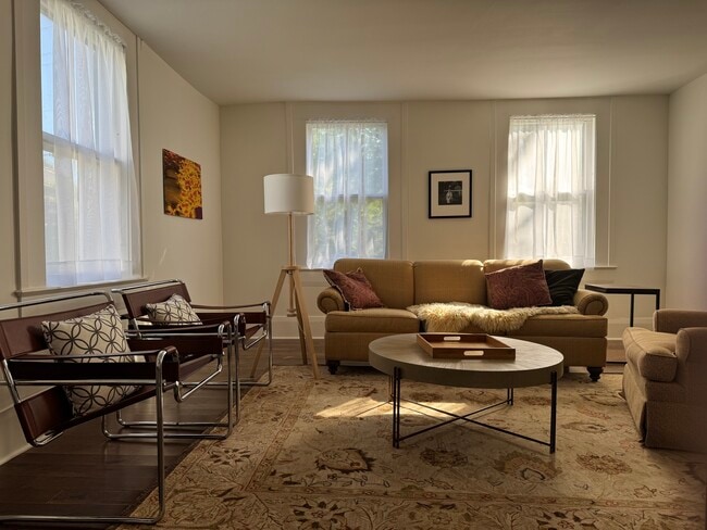 Welcoming Rooms with Tall Windows - 101 Center St