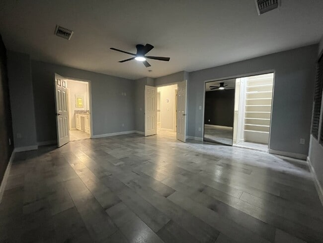 Building Photo - "Charming 4-Bed Oasis with Granite Touch & a Beautiful Pool"