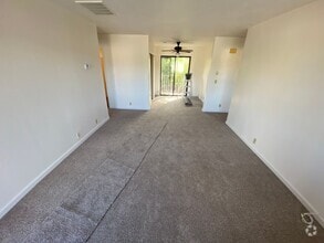 Building Photo - La Tierra Gardens - 2/1 Upstairs Apartment
