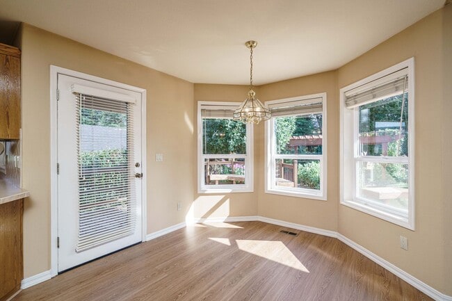 Building Photo - Beautifully Landscaped 1/4 acre with Well Maintained 4 bedroom 2 Bath Home with 3 Car Garage