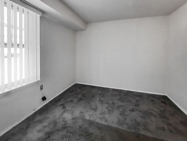 Building Photo - **Spacious 3BR/1BA Condo – Move-In Special...