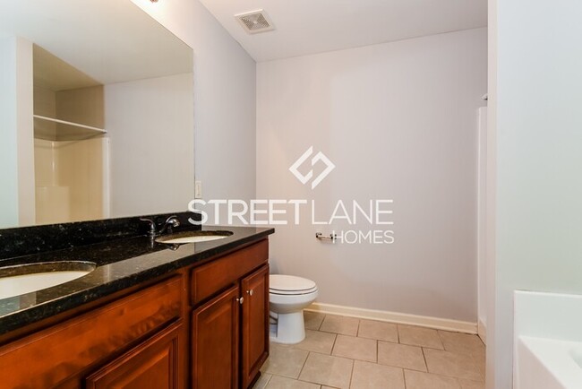 Building Photo - REDUCED! - NOW OFFERING FIRST FULL MONTH F...