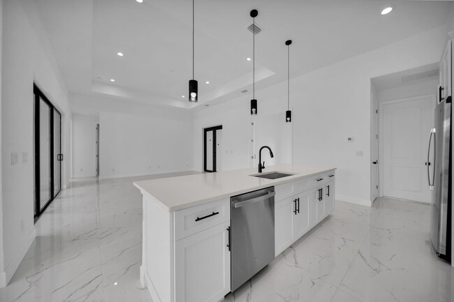 Building Photo - Brand-New Pool Home for Rent – Port Charlo...