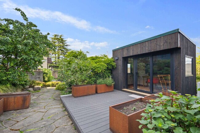 Building Photo - Architectural Madrona Retreat with Panoramic Lake Washington Views, Solar & Detached Office- Avai...
