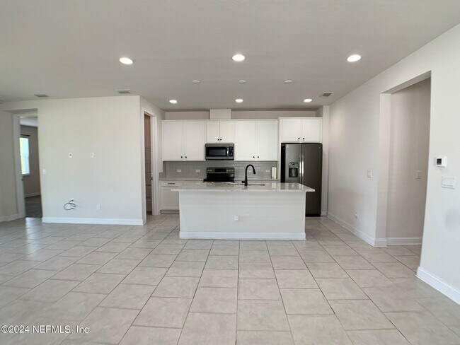 Building Photo - 1499 Tropical Pine Cove