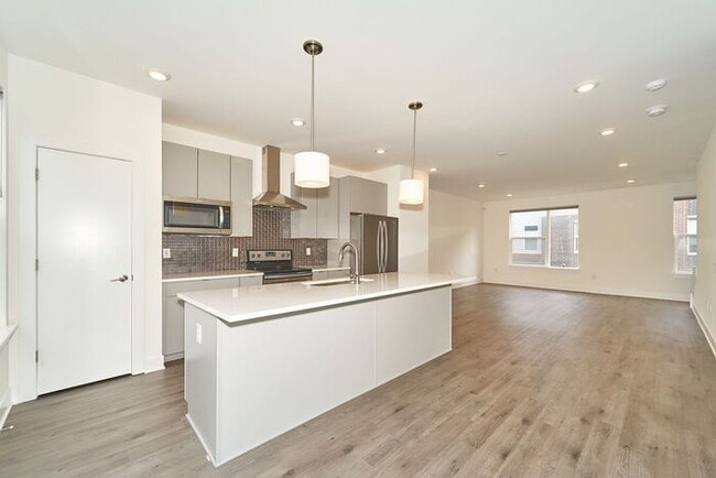 Building Photo - Like New Townhome With Your Own Rooftop Views of Downtown Indy!