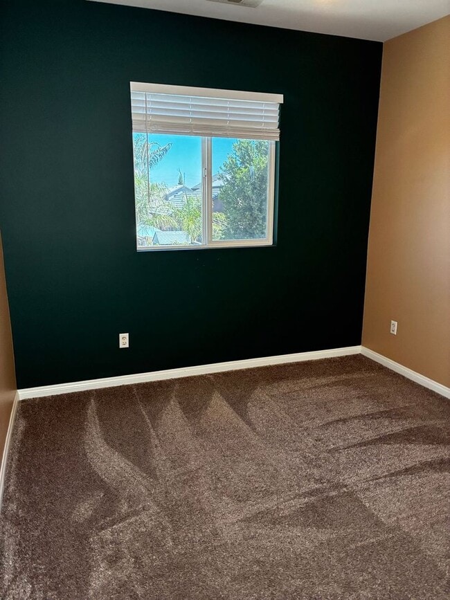 Building Photo - Smart 3-Bedroom Home with Solar & 2-Car Ga...