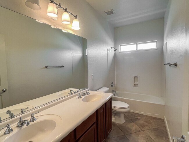 Building Photo - 4 Bed + Office | 3 Bath | 3-Car Garage | E...