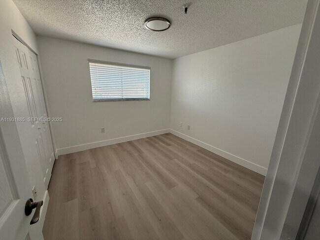 Building Photo - 7835 W 30th Ct