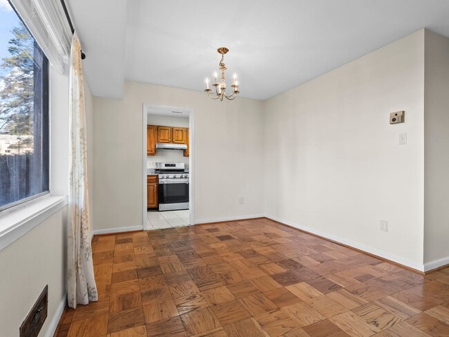 Building Photo - Commuter’s Dream! Large 2BR/2BA Condo Steps from Metro – All Utilities Included!