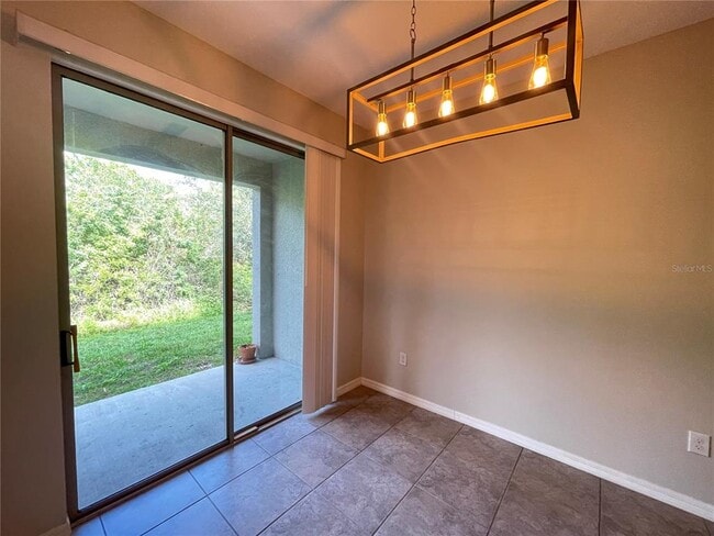 Building Photo - 9768 Pembrooke Pines Dr