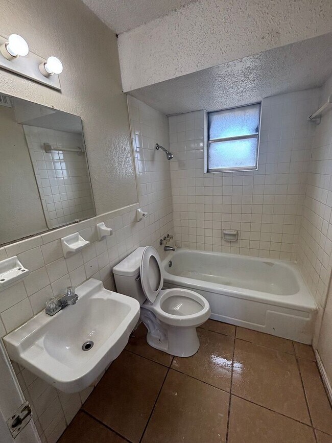 Building Photo - Conveniently Located Studio with ALL Utilities INCLUDED