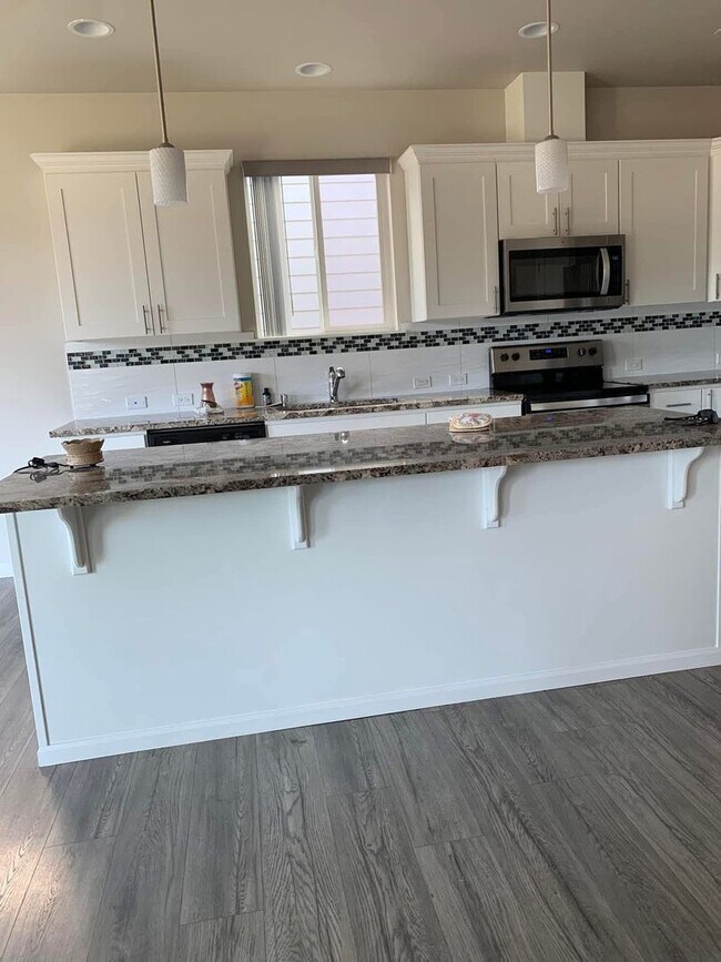 Building Photo - Spacious 4-Bedroom Corner Lot Home with Bonus Room, A/C & Updated Kitchen