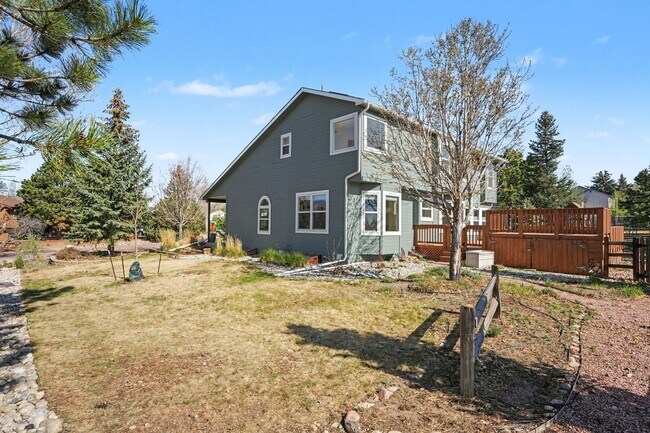 Building Photo - Backs to Open Space | Over 4,000 Sq Ft | Updated Kitchen + Solar