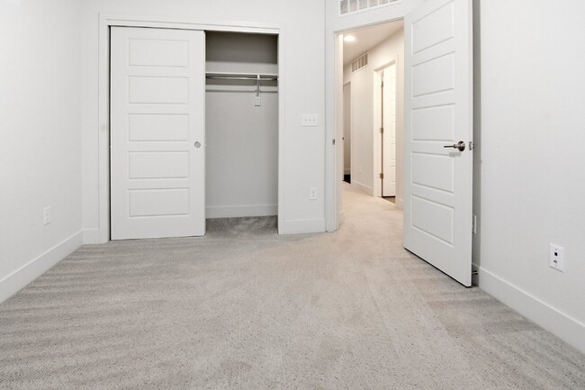 Building Photo - $2,645.95, 3 bed, 2.5 bath end unit located in Aurora with a washer and dryer.