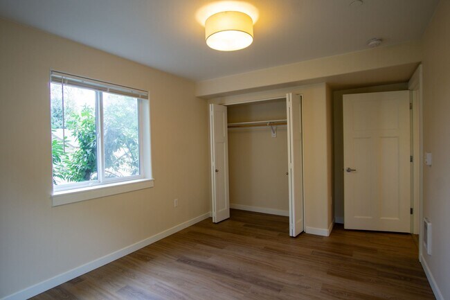 Building Photo - FALL IN LOVE: Bright Corner 2-Bdr w/ Patio...