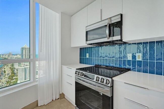 Building Photo - 4401 Collins Ave