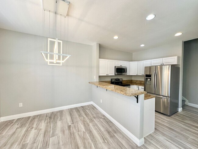 Building Photo - Corner Unit Two Story Townhome in the Beau...