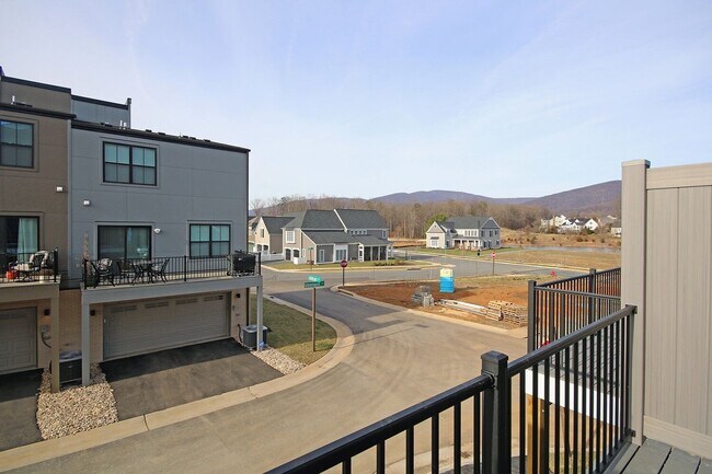 Building Photo - Dog-Friendly Old Trail Townhome - Walk To Local Shops, Restaurants, & More!