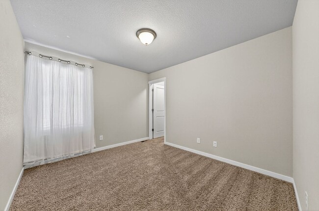 Building Photo - Upgraded 4-Bedroom Corner Lot Home with Mountain Views