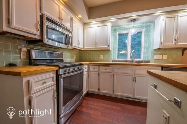 Building Photo - 5631 Whispering Pines Drive
