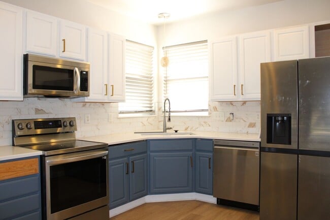 Building Photo - Spacious 2BR Home | Updated Finishes, Pool Access, 2-Car Garage