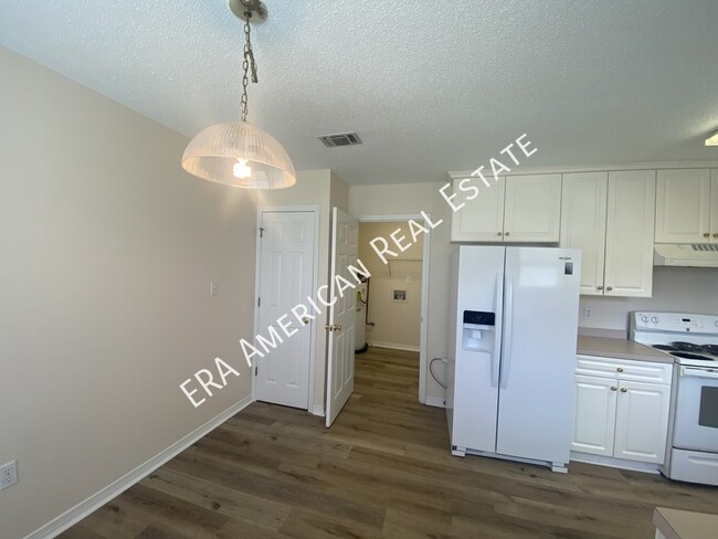 Building Photo - 7468 Woodmont Rd