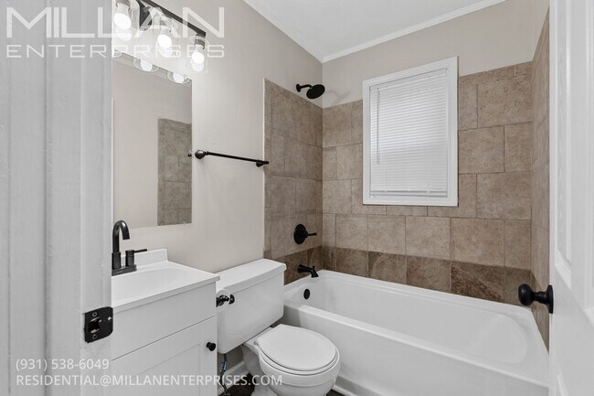 Building Photo - Charming Three Bedroom Home with Natural Privacy and Prime Location