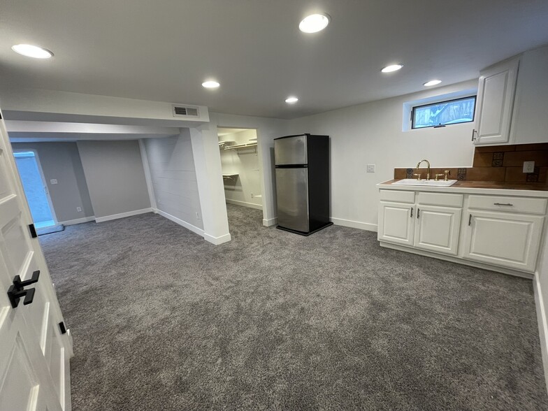 View from open plan bonus room back to primary bedroom and walk-in closet - 508 Daly Ave