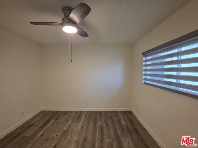Building Photo - 10734 Palms Blvd