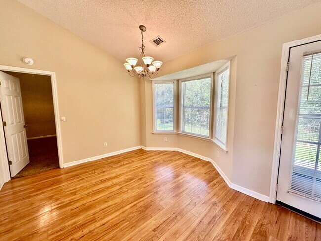 Building Photo - Rivers End Three Bedroom Home with a Fence...