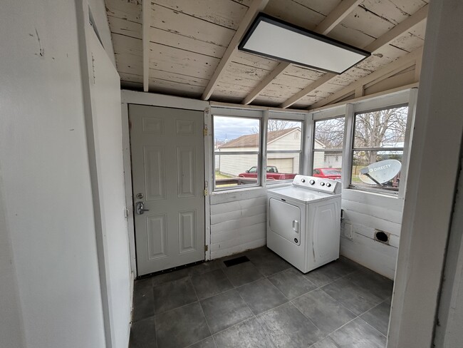 Covered back porch with washer and dryer hookup! - 204 Hamlin Ave