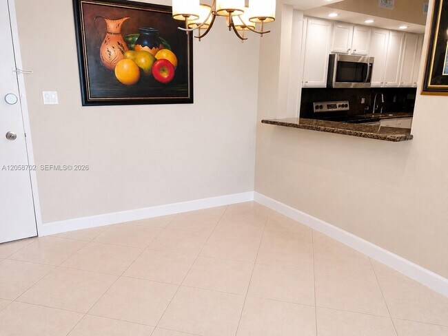 Building Photo - 5600 Collins Ave