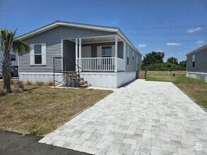 Building Photo - 6661 Hidden Oaks Dr