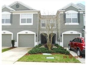 Building Photo - Spacious 3/2.5/1 Townhouse, Lawn Service, Garbage and Water Included