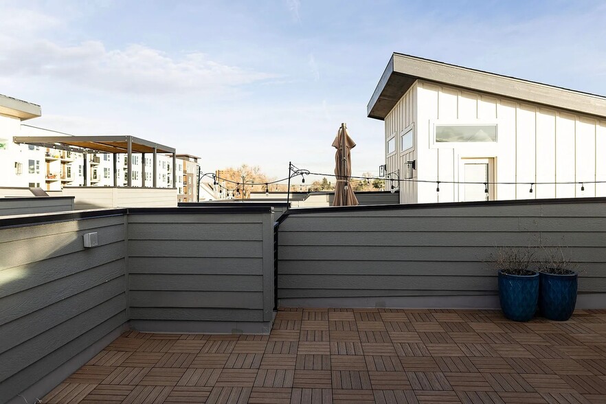 Private rooftop with a view of downtown, DU, mountains, and surrounding areas - 3505 S Marion St